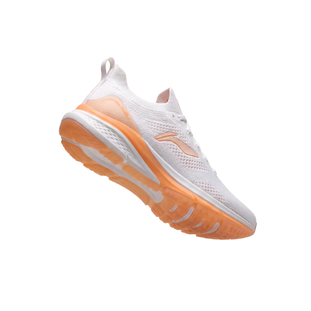 The same sneaker cut out of its background, edges clean around the laces